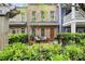 Beautiful townhome with a well-maintained patio and manicured greenery at 719 Hammond Dr, Woodstock, GA 30188