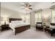 Spacious primary bedroom with natural light and seating, a relaxing retreat at 719 Hammond Dr, Woodstock, GA 30188