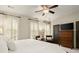 Bright primary bedroom featuring natural light, hardwood accents, and plush carpeting at 719 Hammond Dr, Woodstock, GA 30188