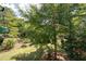 Lush backyard, providing a private outdoor retreat at 737 Dushea Nw Ct, Kennesaw, GA 30144