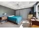 Comfortable bedroom featuring a gray wall, carpet, and a ceiling fan at 737 Dushea Nw Ct, Kennesaw, GA 30144