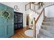 Spacious foyer with hardwood floors, staircase, and a welcoming atmosphere at 737 Dushea Nw Ct, Kennesaw, GA 30144