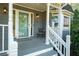 Inviting front entrance with a painted door and decorative plants at 737 Dushea Nw Ct, Kennesaw, GA 30144