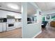 Updated eat-in kitchen with modern appliances and bar seating at 737 Dushea Nw Ct, Kennesaw, GA 30144