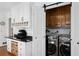 Convenient laundry area with modern washer and dryer, plus plenty of storage at 737 Dushea Nw Ct, Kennesaw, GA 30144