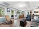 Cozy living room featuring neutral walls, a sliding door, and hardwood flooring at 737 Dushea Nw Ct, Kennesaw, GA 30144