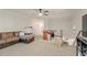 Inviting bonus room featuring a comfortable leather couch and a foosball table for entertainment at 1819 Walker Ridge Sw Dr, Marietta, GA 30064