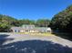 Attractive community clubhouse with ample parking, playground, and covered outdoor seating at 1819 Walker Ridge Sw Dr, Marietta, GA 30064