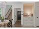 Breakfast nook and stairway featuring decorative lighting and built-in storage at 1819 Walker Ridge Sw Dr, Marietta, GA 30064
