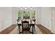 Traditional-style dining room with hardwood floors and wainscoting at 1819 Walker Ridge Sw Dr, Marietta, GA 30064