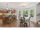 Eat-in kitchen area with natural light, a chandelier, and hardwood floors at 1819 Walker Ridge Sw Dr, Marietta, GA 30064