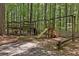 Backyard playground featuring a wooden playset, slide, and climbing structure at 1819 Walker Ridge Sw Dr, Marietta, GA 30064