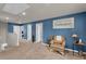 Bonus room with plush carpet, neutral paint, and ample natural light at 206 Prescott St, Locust Grove, GA 30248