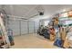 Two-car garage with ample storage space for vehicles and tools at 206 Prescott St, Locust Grove, GA 30248