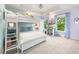 Bedroom featuring a bunk bed, carpet, and an aquarium by the window at 217 Knob Hills Cir, Decatur, GA 30030