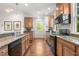 Updated kitchen features granite counters, stainless appliances, and hardwood floors at 217 Knob Hills Cir, Decatur, GA 30030