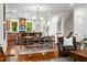 Open concept living room, dining area and kitchen featuring hardwood floors and comfortable seating at 217 Knob Hills Cir, Decatur, GA 30030