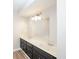 Bathroom with white marble countertops, framed mirror, and neutral wall paint at 4391 Sandy Plains Rd, Marietta, GA 30066