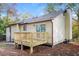 Back exterior elevation of house with new wood deck at 4391 Sandy Plains Rd, Marietta, GA 30066