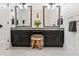 Bright bathroom features dual sink vanity and tile floors at 132 Olympic Pl, Decatur, GA 30030