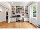 A home office with built-in shelves, a desk, and a comfortable chair at 132 Olympic Pl, Decatur, GA 30030