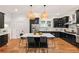Stylish kitchen featuring a center island with seating and stainless steel appliances at 132 Olympic Pl, Decatur, GA 30030
