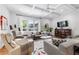 Inviting living room showcasing coffered ceilings, neutral tones, and ample seating at 132 Olympic Pl, Decatur, GA 30030