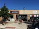 Daytime view of OakHurst Market with outside tables at 132 Olympic Pl, Decatur, GA 30030
