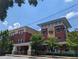 Modern brick school building with clerestory windows and landscaping, located on a sunny street at 132 Olympic Pl, Decatur, GA 30030