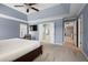 Light-filled main bedroom offering an ensuite bath and access to other rooms at 4044 Kenway Se Pl, Smyrna, GA 30082