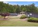Community tennis courts with a covered viewing area and landscaped surroundings at 4044 Kenway Se Pl, Smyrna, GA 30082