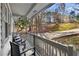 Relax on this home's porch and enjoy the outdoors at 7000 Woodland Nw Pl, Kennesaw, GA 30152