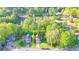 Aerial view of property showcasing the house and the surrounding yard at 986 Franklin Ridge Ct, Sugar Hill, GA 30518