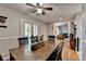 Open concept dining room with lots of natural light and hardwood floors at 986 Franklin Ridge Ct, Sugar Hill, GA 30518