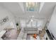 Bright and airy living room with high ceilings, a cozy seating area, and large windows at 1156 Cotton Gin Ct, Lawrenceville, GA 30045