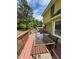 Inviting deck with glass table, outdoor seating perfect for entertaining or enjoying the backyard view at 2246 Carrington Dr, Ellenwood, GA 30294