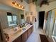 Bathroom featuring a double sink vanity with wood cabinets and a separate shower and tub at 2246 Carrington Dr, Ellenwood, GA 30294