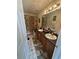 The bathroom has a vanity with double sinks, a shower and decorative floor mats at 2246 Carrington Dr, Ellenwood, GA 30294