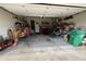 Spacious garage featuring ample storage shelves, tools, and equipment, offering organization and functionality at 2246 Carrington Dr, Ellenwood, GA 30294