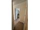 Hallway view towards bedroom at 2246 Carrington Dr, Ellenwood, GA 30294