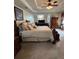 Spacious main bedroom showcasing a comfortable bed, elegant furnishings, and relaxing ambience at 2246 Carrington Dr, Ellenwood, GA 30294