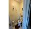 Small powder room with a toilet, basic fixtures, and neutral wall color at 2246 Carrington Dr, Ellenwood, GA 30294