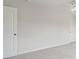 Neutral bedroom with carpet, a ceiling fan, and doors to the hallway and closet at 3625 New River Ct, Cumming, GA 30040