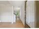 Bright entryway with hardwood floors and decorative wainscoting at 3625 New River Ct, Cumming, GA 30040