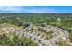 New construction homes in a suburban neighborhood surrounded by lush green forests and rolling hills at 5749 Creek Indian Dr, Sugar Hill, GA 30518