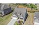Beautiful aerial view of the home in a suburban neighborhood at 5749 Creek Indian Dr, Sugar Hill, GA 30518
