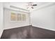 Bright bedroom with recessed lighting, ceiling fan, and large windows at 5749 Creek Indian Dr, Sugar Hill, GA 30518