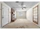 Comfortable living room with a brick fireplace and ceiling fan at 60 Highland Dr, Stockbridge, GA 30281