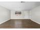 Large, neutral-toned living room with modern flooring and ample natural light at 60 Highland Dr, Stockbridge, GA 30281