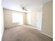 Bedroom with carpet flooring, a ceiling fan and a window that fills the space with natural light at 3413 Creekview Dr, Rex, GA 30273